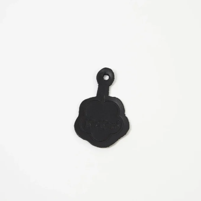 Fleurette en cuir unisexe noire Fleurette en cuir unisexe noire